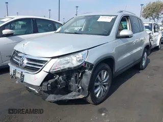 2011 Volkswagen Tiguan SEL with VIN WVGBV7AX2BW500817, listed as a IAAI auction lot 42292760 with 50,336 mi miles and . Bid and sale history available at DreamBid. Image 2.