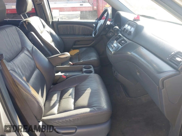 2005 Honda Odyssey EX-L z VIN 5FNRL38635B416982, wystawiony jako IAAI lot #42337383 z przebiegiem 350 647 mil mil oraz . Historia ofert i sprzedaży dostępna na DreamBid. Obrazek 5.