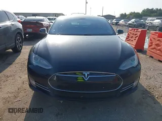 2014 Tesla Model S 60 with VIN 5YJSA1H12EFP39873, listed as a IAAI auction lot 42443414 with 132,773 mi miles and . Bid and sale history available at DreamBid. Image 12.