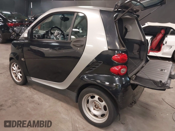 2010 Smart fortwo Pure with VIN WMEEJ3BA7AK402342, listed as a IAAI auction lot 42417829 with 38,225 mi miles and . Bid and sale history available at DreamBid. Image 3.