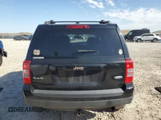 2014 Jeep Patriot Latitude with VIN 1C4NJRFB5ED855888, listed as a Copart auction lot 57969355 with 113,196 mi miles and Salvage title. Bid and sale history available at DreamBid. Image 6.