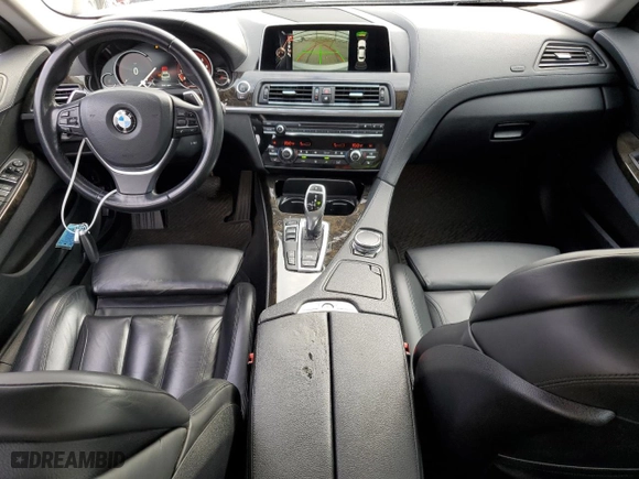 2016 BMW 6 Series 650i xDrive with VIN WBA6D6C52GG387898, listed as a Copart auction lot 77109254 with 106,134 mi miles and Salvage Title. Bid and sale history available at carsss.com. Image 8.