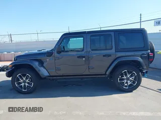 2024 Jeep Wrangler Sport S with VIN 1C4RJXN61RW192386, listed as a IAAI auction lot 42001810 with 7,426 mi miles and . Bid and sale history available at DreamBid. Image 14.