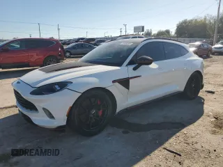 2021 Aston Martin DBX z VIN SCFVUJAW8MTV02134, wystawiony jako Copart lot #72456004 z przebiegiem Nie podano mil oraz Szkody całkowita. Historia ofert i sprzedaży dostępna na DreamBid. Obrazek 1.