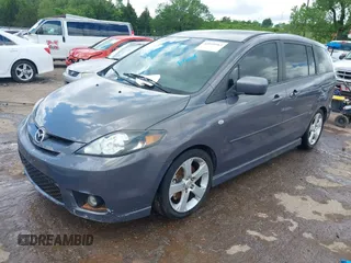2007 Mazda 5 Touring с VIN JM1CR29L670147011, выставлен на аукционе IAAI как лот 42199963 с пробегом 169 914 миль миль и . История ставок и продаж доступна на DreamBid. Изображение 2.