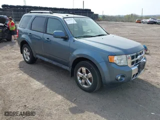 2010 Ford Escape Limited with VIN 1FMCU9EG2AKD38433, listed as a IAAI auction lot 42127937 with 156,798 mi miles. Bid and sale history available at carsss.com. Image 1.