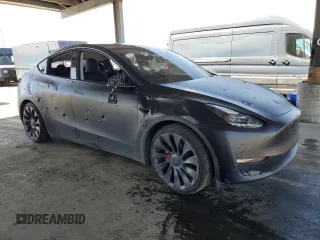 2024 Tesla Model Y Performance z VIN 7SAYGDEFXRF037934, wystawiony jako Copart lot #52126255 z przebiegiem 27 366 mil mil oraz Szkoda całkowita • Salvage title. Historia ofert i sprzedaży dostępna na DreamBid. Obrazek 4.