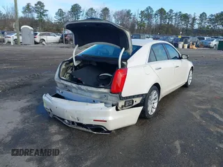 2014 Cadillac CTS Sedan RWD with VIN 1G6AP5SX2E0128760, listed as a IAAI auction lot 41719528 with 101,916 mi miles. Bid and sale history available at carsss.com. Image 4.