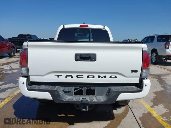 2023 Toyota Tacoma SR z VIN 3TYRZ5CN5PT034397, wystawiony jako IAAI lot #42055222 z przebiegiem 39 144 mil mil oraz . Historia ofert i sprzedaży dostępna na DreamBid. Obrazek 17.
