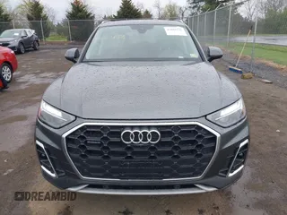 2023 Audi Q5 S line Premium Plus z VIN WA1EAAFY1P2044460, wystawiony jako IAAI lot #42003132 z przebiegiem 28 434 mil mil oraz . Historia ofert i sprzedaży dostępna na DreamBid. Obrazek 12.