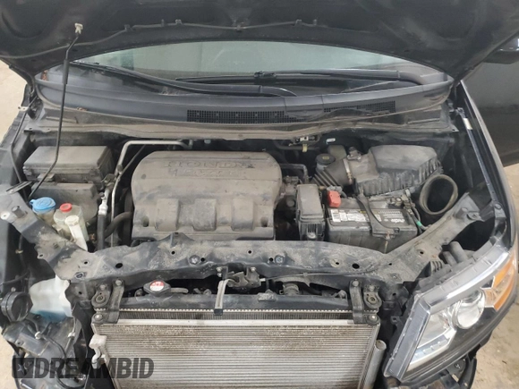 2015 Honda Odyssey EX-L with VIN 5FNRL5H62FB014772, listed as a Copart auction lot 55088925 with 144,152 mi miles and Salvage Title. Bid and sale history available at DreamBid. Image 12.