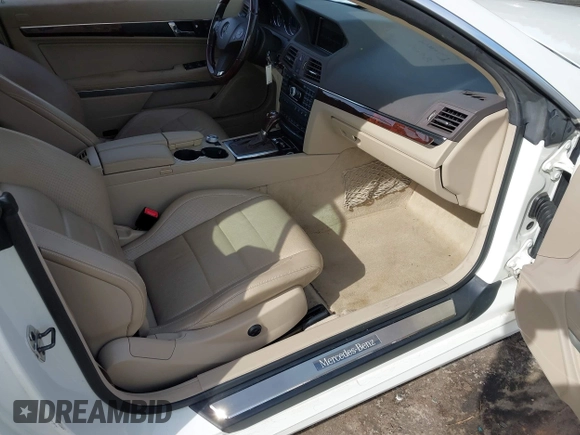 2011 Mercedes-Benz E-Class E 550 with VIN WDDKK7CF4BF093607, listed as a IAAI auction lot 41596557 with 128,548 mi miles. Bid and sale history available at carsss.com. Image 5.