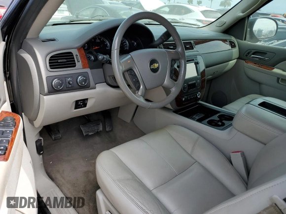 2013 Chevrolet Suburban with VIN 1GNWKMEG4DR257785, listed as a Copart auction lot 76817344 with 68,021 mi miles and Salvage title. Bid and sale history available at DreamBid. Image 8.