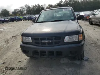 2001 Isuzu Rodeo S with VIN 4S2CK58W214338866, listed as a Copart auction lot 85280494 with 57,279 mi miles and Clean title. Bid and sale history available at DreamBid. Image 5.