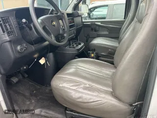 2012 Chevrolet Express Cargo Van with VIN 1GCSGAFX3C1188025, listed as a IAAI auction lot 42111757 with 177,137 mi miles. Bid and sale history available at carsss.com. Image 2.