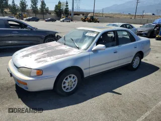 1995 Toyota Camry LE z VIN JT2SK12E8S0296060, wystawiony jako Copart lot #58246145 z przebiegiem 373 103 mil mil oraz Szkoda całkowita • Salvage title. Historia ofert i sprzedaży dostępna na DreamBid. Obrazek 1.