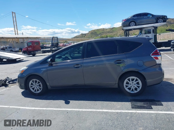 2015 Toyota Prius Two with VIN JTDZN3EU2FJ031520, listed as a IAAI auction lot 41950491 with 174,379 mi miles and . Bid and sale history available at DreamBid. Image 14.