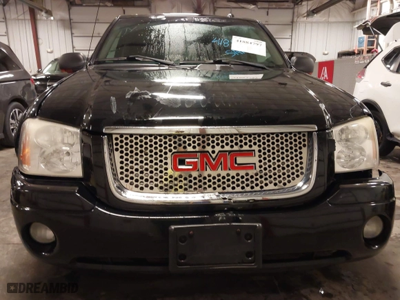 2004 GMC Envoy SLE with VIN 1GKDT13S542265104, listed as a IAAI auction lot 41884797 with 154,190 mi miles. Bid and sale history available at carsss.com. Image 13.