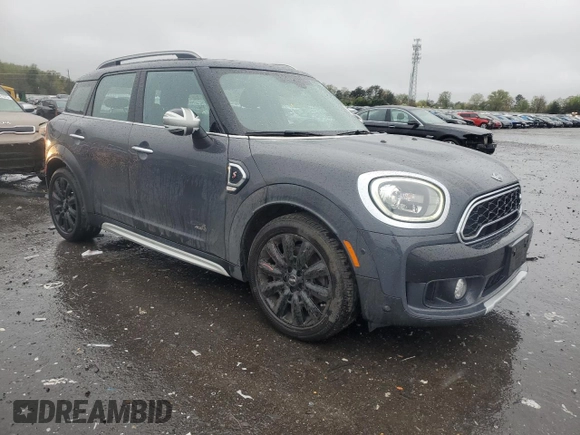 2017 MINI Countryman Cooper S with VIN WMZYT5C30H3D80211, listed as a Copart auction lot 52933305 with 51,206 mi miles and Salvage title. Bid and sale history available at DreamBid. Image 4.