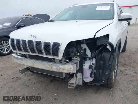 2020 Jeep Cherokee Latitude Plus with VIN 1C4PJLLB3LD543821, listed as a IAAI auction lot 41290132 with 130,137 mi miles. Bid and sale history available at carsss.com. Image 6.