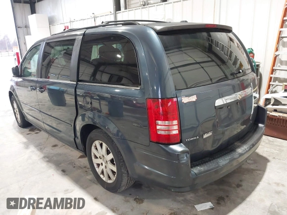 2008 Chrysler Town & Country Touring with VIN 2A8HR54P38R684386, listed as a IAAI auction lot 41463061 with 140,392 mi miles. Bid and sale history available at carsss.com. Image 3.