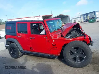2015 Jeep Wrangler Unlimited Sport with VIN 1C4BJWDG4FL694005, listed as a IAAI auction lot 41971529 with Not provided miles and . Bid and sale history available at DreamBid. Image 13.