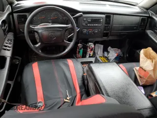 2003 Dodge Dakota Sport with VIN 1D7HL38N63S192308, listed as a Copart auction lot 77494684 with 128,512 mi miles and Salvage Title. Bid and sale history available at carsss.com. Image 8.