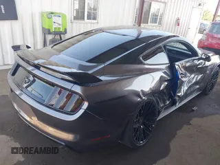2017 Ford Mustang EcoBoost z VIN 1FA6P8TH9H5215435, wystawiony jako IAAI lot #42531715 z przebiegiem 81 730 mil mil oraz . Historia ofert i sprzedaży dostępna na DreamBid. Obrazek 4.