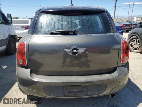 2014 MINI Countryman with VIN WMWZB3C54EWR39731, listed as a Copart auction lot 63635215 with 85,751 mi miles and Salvage title. Bid and sale history available at DreamBid. Image 6.
