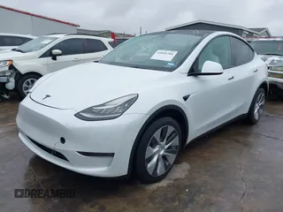 2022 Tesla Model Y Long Range with VIN 7SAYGDEE3NF380067, listed as a IAAI auction lot 41016704 with 52,180 mi miles and . Bid and sale history available at DreamBid. Image 24.