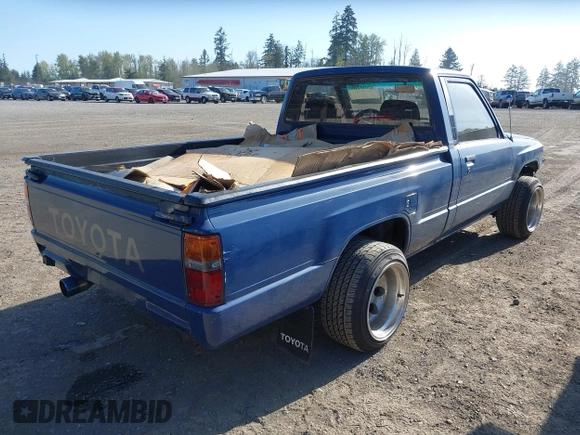 1987 Toyota Pickup with VIN JT4RN50RXH0283460, listed as a IAAI auction lot 42086809 with 183,562 mi miles and . Bid and sale history available at DreamBid. Image 4.