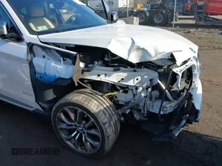 2019 BMW X6 xDrive35i with VIN 5UXKU2C57K0Z63351, listed as a IAAI auction lot 41637597 with 91,121 mi miles. Bid and sale history available at carsss.com. Image 17.