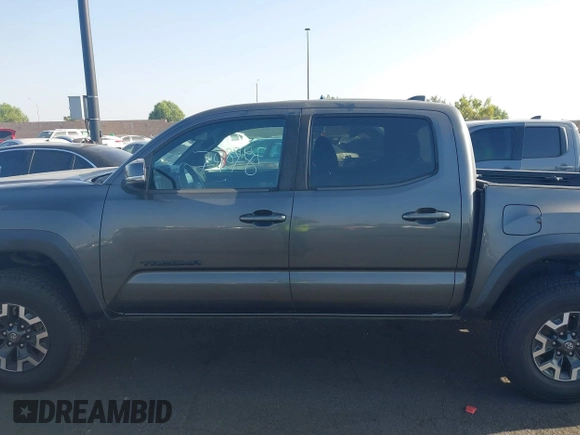 2019 Toyota Tacoma SR with VIN 3TMCZ5AN7KM251625, listed as a IAAI auction lot 42527478 with 45,689 mi miles and . Bid and sale history available at DreamBid. Image 14.
