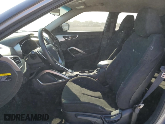 2016 Hyundai Veloster z VIN KMHTC6AD7GU300528, wystawiony jako Copart lot #57501955 z przebiegiem 72 437 mil mil oraz Szkoda całkowita • Salvage title. Historia ofert i sprzedaży dostępna na DreamBid. Obrazek 7.