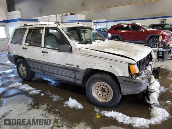 1993 Jeep Grand Cherokee Laredo with VIN 1J4GZ58Y2PC658787, listed as a Copart auction lot 41687765 with 166,262 mi miles and Salvage Title. Bid and sale history available at carsss.com. Image 4.