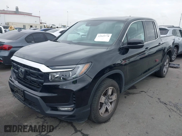 2024 Honda Ridgeline RTL with VIN 5FPYK3F56RB004027, listed as a IAAI auction lot 42049778 with 35,631 mi miles and . Bid and sale history available at DreamBid. Image 2.