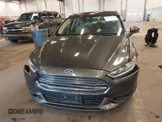 2016 Ford Fusion SE Hybrid with VIN 3FA6P0LU9GR235291, listed as a IAAI auction lot 41560312 with 112,777 mi miles. Bid and sale history available at carsss.com. Image 11.
