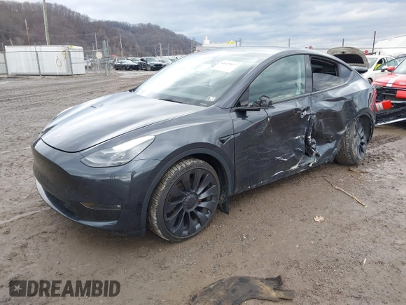 2024 Tesla Model Y Performance with VIN 7SAYGDEF7RF020203, listed as a IAAI auction lot 41639077 with 14,493 mi miles and . Bid and sale history available at DreamBid. Image 2.
