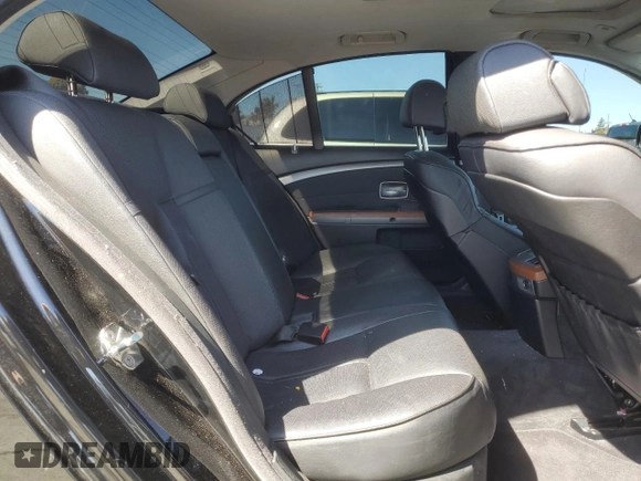 2003 BMW 7 Series 745i with VIN WBAGL634X3DP63533, listed as a Copart auction lot 49538815 with 126,926 mi miles and Salvage Title. Bid and sale history available at carsss.com. Image 10.