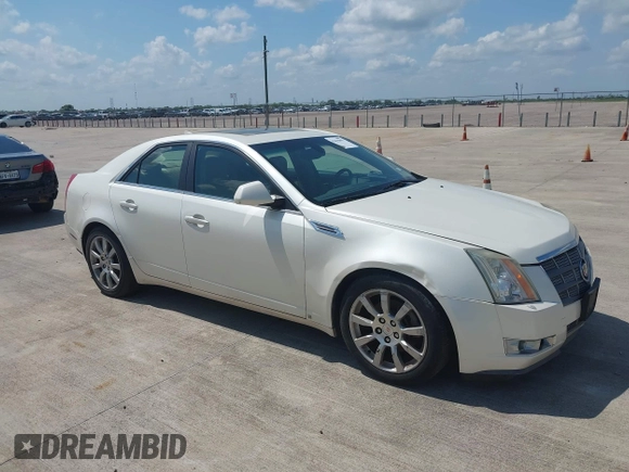 2009 Cadillac CTS AWD z VIN 1G6DS57V690103191, wystawiony jako IAAI lot #42418891 z przebiegiem 151 562 mil mil oraz . Historia ofert i sprzedaży dostępna na DreamBid. Obrazek 1.