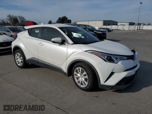 2019 Toyota C-HR XLE with VIN JTNKHMBX3K1036759, listed as a Copart auction lot 48520215 with 56,609 mi miles and Salvage Title. Bid and sale history available at DreamBid. Image 4.