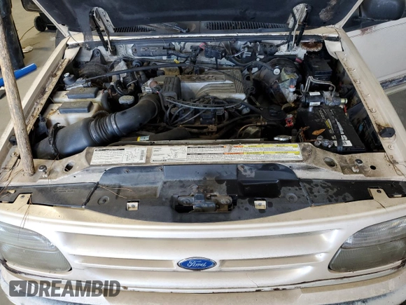 1996 Ford Explorer XLT z VIN 1FMDU32P0TZB87284, wystawiony jako Copart lot #82184024 z przebiegiem 117 882 mil mil oraz Nie do naprawy • Non repairable. Historia ofert i sprzedaży dostępna na DreamBid. Obrazek 12.
