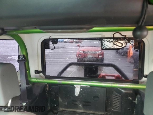 2009 Jeep Wrangler X with VIN 1J4FA24179L700884, listed as a Copart auction lot 52194055 with 96,189 mi miles and Salvage Title. Bid and sale history available at DreamBid. Image 10.