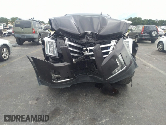 2018 Cadillac Escalade Luxury z VIN 1GYS3BKJ7JR204609, wystawiony jako IAAI lot #40951011 z przebiegiem 79 335 mil mil oraz . Historia ofert i sprzedaży dostępna na DreamBid. Obrazek 6.