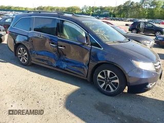 2017 Honda Odyssey Touring z VIN 5FNRL5H98HB017219, wystawiony jako IAAI lot #42306988 z przebiegiem 103 457 mil mil oraz . Historia ofert i sprzedaży dostępna na DreamBid. Obrazek 1.