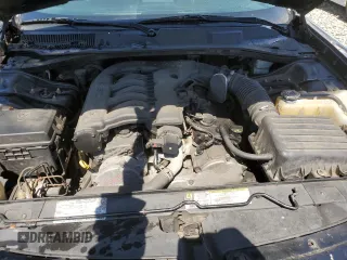 2008 Dodge Charger z VIN 2B3LA43GX8H294087, wystawiony jako Copart lot #54843755 z przebiegiem 208 359 mil mil oraz Szkoda całkowita • Salvage title. Historia ofert i sprzedaży dostępna na DreamBid. Obrazek 11.
