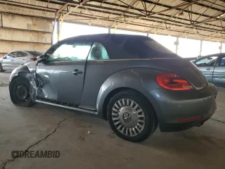 2016 Volkswagen Beetle Denim с VIN 3VW507AT8GM802601, выставлен на аукционе Copart как лот 60335415 с пробегом 71 163 миль миль и Списание • Salvage title. История ставок и продаж доступна на DreamBid. Изображение 2.