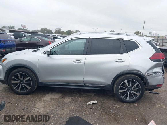 2020 Nissan Rogue SL with VIN 5N1AT2MTXLC701980, listed as a IAAI auction lot 41032122 with 85,287 mi miles. Bid and sale history available at carsss.com. Image 14.