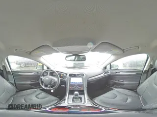 2016 Ford Fusion Titanium Hybrid z VIN 3FA6P0RU5GR356987, wystawiony jako Copart lot #48211775 z przebiegiem 145 192 mil mil oraz Szkoda całkowita • Salvage title. Historia ofert i sprzedaży dostępna na DreamBid. Obrazek 12.