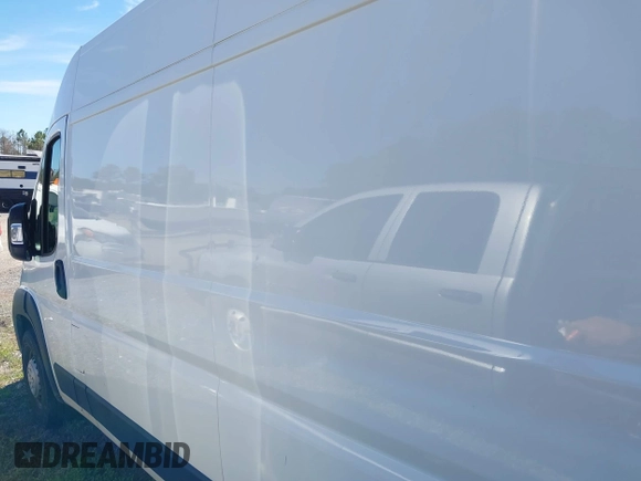 2024 Ram ProMaster Cargo Tradesman with VIN 3C6LRVDGXRE132198, listed as a IAAI auction lot 41723893 with 12,388 mi miles and . Bid and sale history available at DreamBid. Image 14.